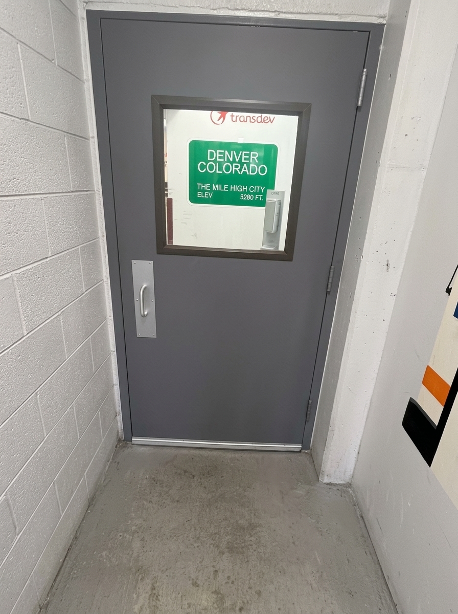 Secure hollow metal door with commercial hardware at Transdev Denver